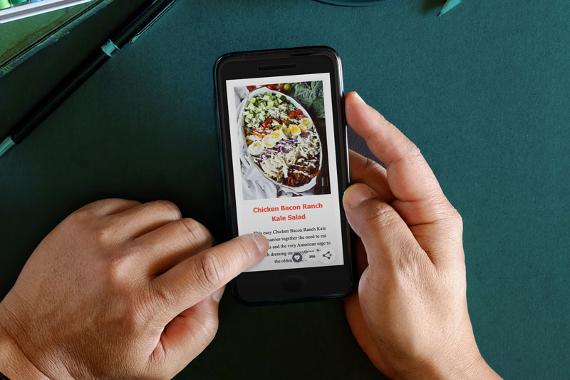 person using phone on website with grow.me widget